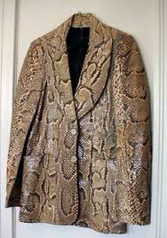 Every time i watch this movie, that hideous snakeskin jacket makes me cringe.that thing should be cleaned, then burned. Nicolas Cage Uncyclopedia The Content Free Encyclopedia