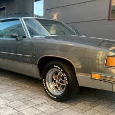 Image result for Light Driftwood 1987 Oldsmobile