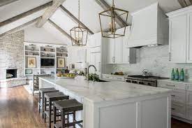 Many rooms with vaulted ceilings have a skylight, an additional luxury due to the minimum roof inhibition. White Contemporary Kitchen With Vaulted Ceilings Hgtv Faces Of Design Hgtv