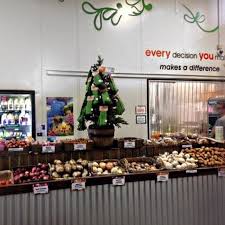 Its Beginning To Look A Lot Like Christmas Fruity Sacks Trees In Canara Organic Market Place A Fantastic Health Foods Organic Market Holiday Decor Christmas