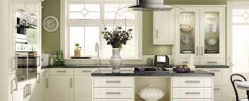 You can also match the sage units with a cream backsplash or wall paint if you want to. Cream Kitchen Green Walls Novocom Top