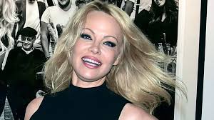 Pamela Anderson marries 'Trump of Hollywood' who had fling with Barbra  Streisand