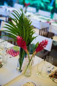 Beautiful Simple Tropical Centerpiece Flower Arrangement By Hoi An Events Ho Tropical Centerpieces Flower Centerpieces Wedding Tropical Flower Arrangements
