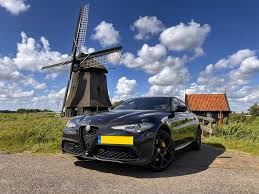 Image result for Rosso Competizione 2011 Giulietta