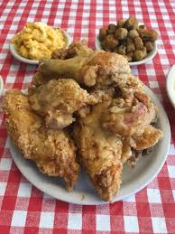 Fried boneless thighs, collard greens, mashed potatoes & gravy with biscuits. Matthews Cafeteria