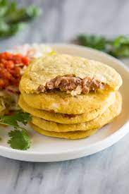 Pupusas are an el salvador treat, consisting of thick corn tortillas stuffed with cheese, beans, and/or marian blazes is a freelance writer and recipe developer with a passion for south american food. Easy Homemade Pupusas Tastes Better From Scratch