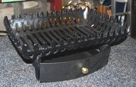 The most common fireplace ash pan material is metal. Mini Cast Iron Dog Grate Basket Savvysurf Co Uk