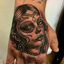Dia de los muertos tattoo hand. 155 Day Of The Dead Tattoo Ideas And Everything You Need To Know Wild Tattoo Art
