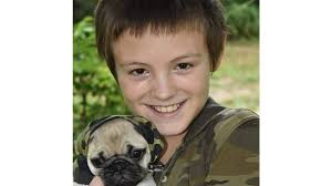 Boy, dog killed in Science Hill house fire identified in obit