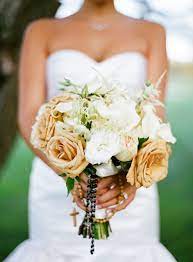 I especially love the rose hips or white berries as a unique texture. Cream And White Bridal Bouquet