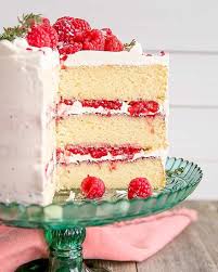 Rich, moist cake is filled with an easy raspberry filling and topped with luscious cream cheese frosting. Raspberry Cake With White Chocolate By Livforcake Quick Easy Recipe The Feedfeed