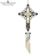 This product changes colors at night. Thomas Kinkade Heavensong Faith Wind Chime