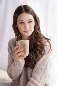 See woman drinking tea cartoon stock video clips. Beautiful Woman Drinking Coffee In The Morning Sitting By The Window Stock Photo Picture And Royalty Free Image Image 36738234