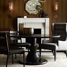 It has an open concept floor plan that accommodates a living room area, a kitchen with a bar counter, and a dining area. Craftsman Dining Table Craftsman Style Round Oak Dining Table