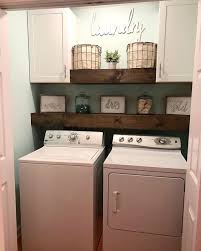 This small laundry room designed by gail davis is bursting with personality, from the colorful wallpaper, to the framed artwork, blue trim, and striped penny tile floors. Optimize Your Small Space Learn Trick How To Organize Your Dryer Sheets Laundry Room Cabinet Laundry Room Makeover Small Laundry Rooms Laundry Room Design