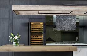 Wall of cupboards near kitchen. A Moody Modern Kitchen Design By Maker May Habitus Living