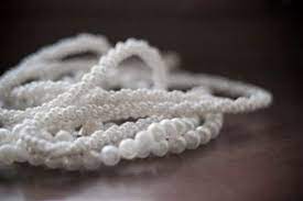 Using a clean iron on it's lowest heating setting, begin ironing your wedding gown. How To Whiten Yellowed Pearls How To Clean Pearls Pearls Yellow Pearl