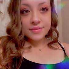 What is happening to the caterpillar with wasp larvae emerging from it?