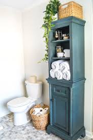 How To Turn A Cabinet Into A Hamper In Seconds Bless Er House Linen Cabinet Laundry Room Storage Bathroom Linen Cabinet