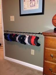 Diy Hat Rack I Used A Curtain Rod Shower Curtain Hooks And Office Clips Your Welcome Bro Diy Hat Rack Boy Room Rack Ideas