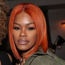 Brown hair, darker skin, freckles, and blue eyes. 27 Red Hair Color Ideas For Every Skin Tone In 2021 Allure