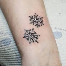 50 Cute Snowflake Tattoo Ideas Express Your Individuality With These Icy Little Marvels Tattooideasunique Snow Flake Tattoo Christmas Tattoo Tattoos