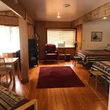Grounds include a pire pit with wood provided horseshoes, lawn chairs and lawn games. Sol Duc Cabins Home Facebook