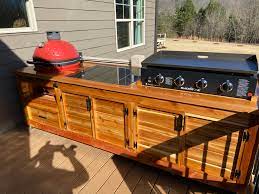 Rustic outdoor kitchens ideas feature wooden fixtures and a variety of stone and rock accents. Kamado Grill Blackstone Griddle Table Ryobi Nation Projects