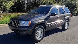 Image result for Brilliant Black 2002 Jeep