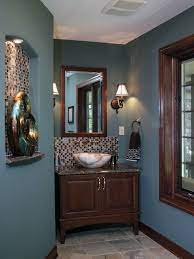 This spacious bathroom was large enough for a freestanding bath as well as walk in shower and double basins. Decoration Chic Deep Blue Wall Paint Color Traditional Powder Room With Brown Accent And Two White Shade W Brown Bathroom Decor Brown Bathroom Bathroom Colors