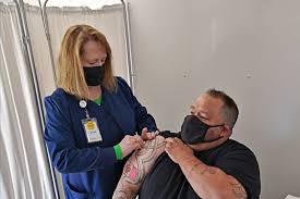 It displays the following information for the user's community by age group: Border Communities Offer Surplus Covid Vaccines To Canadian Neighbors