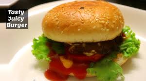 Place the burgers on the griddle or into the pan, then use a spatula to lightly press them down, making sure the burger is in full contact with the pan. Tasty Juicy Beef Burger Recipe Easy Burger Recipe At Home Burger My City Food Secrets
