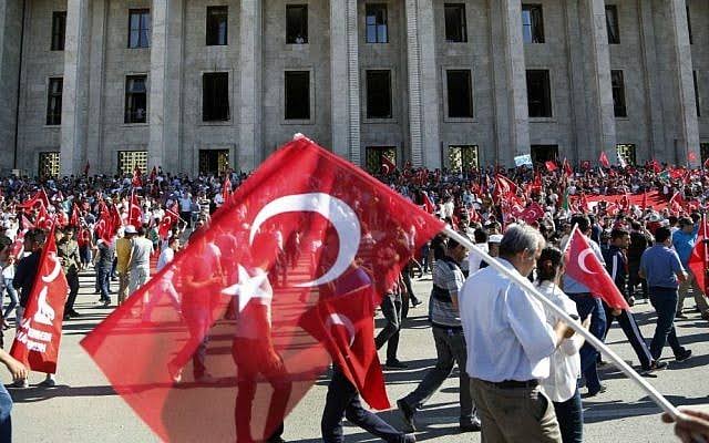 Turkish flags flying outside the parliament building in Ankara.