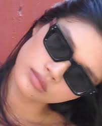 Hui wears the latest La Isla in Gloss Black, ⁠, 📲available via  oscarandfrank.com⁠, ⁠, #anewstandard