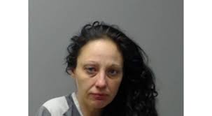 Woman accused of breaking into two Midway homes