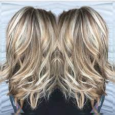 Here she is rocking heavy blonde highlights on top of her natural dark roots. Blonde Highlights And Lowlights Google Search Hair Styles Hair Lengths Hair Color