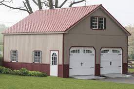 Its amazing that only two people can assemble this so quickly. 2 Story Double Wide Garage Wood Amish Backyard Structures