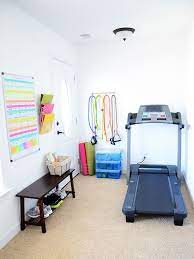 15 Things Every Workout Nook Needs Domino Workout Room Home Gym Room At Home Small Home Gym Ideas