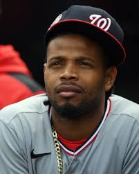 Nats withstand Rockies' late comeback, win 12-11