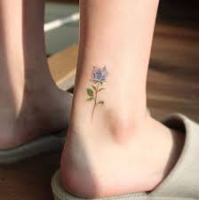 A Blue Rose By Saegeem Ankle Tattoo Small Blue Rose Tattoos Ankle Tattoos For Women