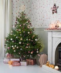 For an artificial tree, assemble it according to the manufacturer's directions.then shape the branches and tips for a full, natural look. Real Christmas Trees How To Buy Decorate And Care For Your Fir