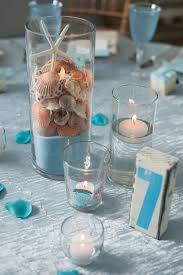 Marriage ceremony, proposal, bridesmaids favor. Adorable Centerpieces Table Numbers From A Beach Themed Wedding More On The Blog Beach Centerpieces Beach Theme Centerpieces Beach Wedding Centerpieces