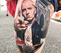 His reall name is marshall bruce mathers iii and well known by eminem (stylized as eminǝm) and by his alter ego slim shady.he was born in october 17, 1972. Eminem Tattoo By Yeyo Tattoos Post 25857