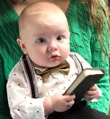 Introducing a child to the Bible with a personalized Gideon New Testament