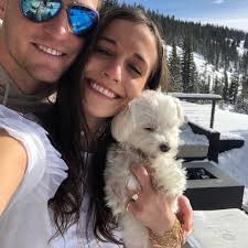 A proposal of all proposals! Nick's oldest son popped the question to his  longtime love atop Aspen mountain with their dog (child) as a witness. He  then surprised her by having all