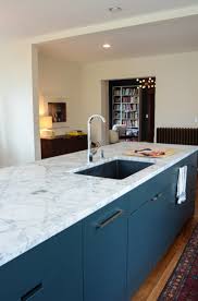 Not all of the bowls and cups are in the cabinet, some were in the dishwasher. Marble Countertops 101 Yes They Re A Great Idea Apartment Therapy