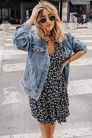This thin turtleneck is perfect for layering and is super flattering. The Art Of Pulling Off A Denim Jacket No Matter The Season Long Denim Jacket Denim Jacket With Dress Denim Jacket