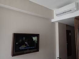 Room wall mounted air conditioner. Wall Mounted Lcd Television And Individual Split Type Air Conditioner Picture Of Hotel Terrace At Kuta Tripadvisor