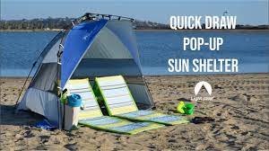 You pull the cord on the hub system, and the center room pops open. How To Set Up And Take Down The Lightspeed Outdoors Quick Draw Pop Up Shelter Beach Tent Youtube