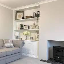 ammonite walls cosy living room living room shelves sitting room decor